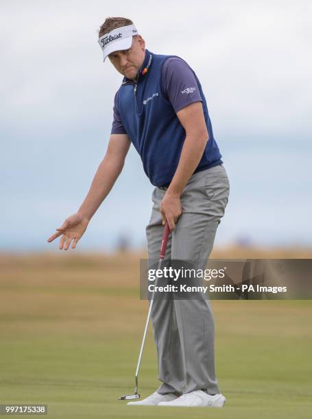 Ian Poulter reacts to missing his putt on the 9th hole during day one of the Aberdeen Asset Management Scottish Open at Gullane Golf Club, East...