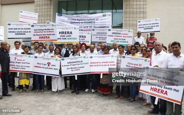 Greenpolis buyers shout slogans during protest in front of Haryana Real Estate Regulatory Authority office, at Court Road, on July 12, 2018 in...