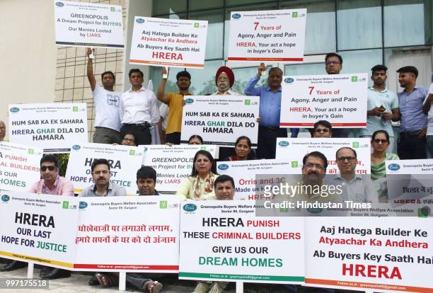Greenpolis buyers shout slogans during protest in front of Haryana Real Estate Regulatory Authority office, at Court Road, on July 12, 2018 in...