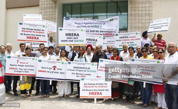 Greenpolis buyers shout slogans during protest in front of Haryana Real Estate Regulatory Authority office, at Court Road, on July 12, 2018 in...