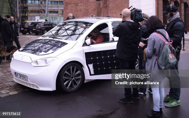 Simone Peter, co-chair of Germany's Green party, sitting in the 'Sion' made by Sono Motors during a test drive in Berlin, Germany, 11 October 2017....