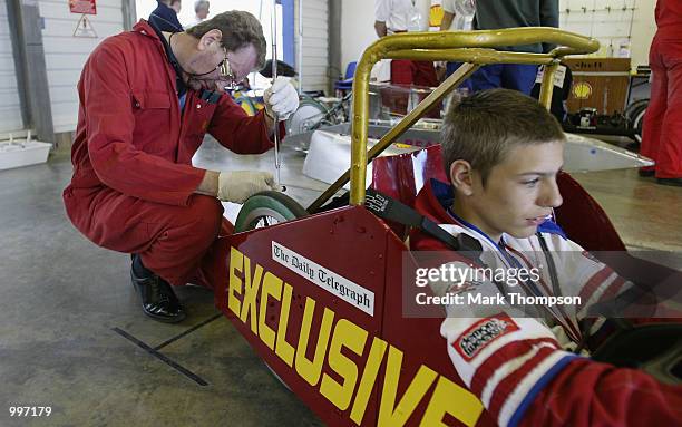 Competitors in action during the Shell Eco Marathon event at the Rockingham Motor Speedway in Corby on July 11, 2002. The cars were competing to beat...