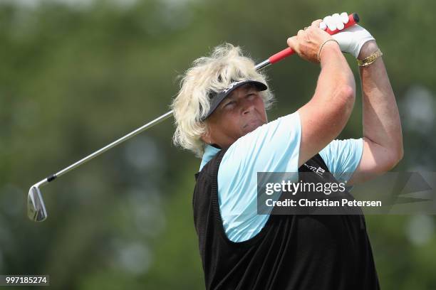 Laura Davies of England plays a tee shot on the ninth hole during the first round of the U.S. Senior Women's Open at Chicago Golf Club on July 12,...