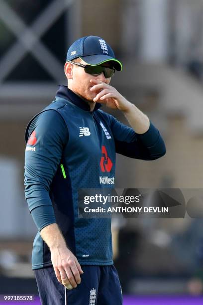 England captain Eoin Morgan reacts during the One Day International cricket match between England and India at Trent Bridge in Nottingham central...