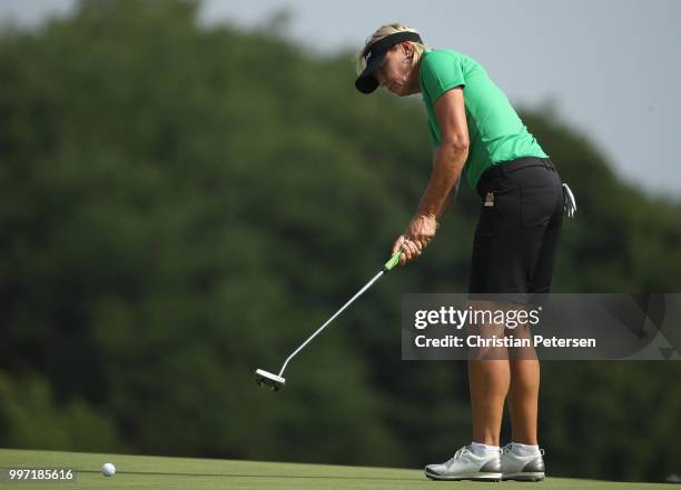 Liselotte Neumann of Sweden putts on the seventh green during the first round of the U.S. Senior Women's Open at Chicago Golf Club on July 12, 2018...