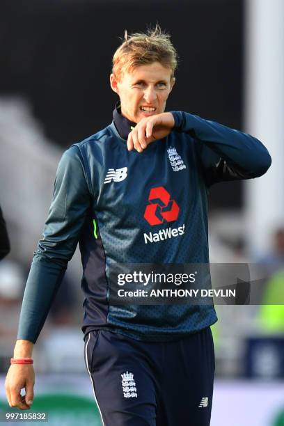 England's Joe Root reacts as India win the One Day International cricket match between England and India at Trent Bridge in Nottingham central...
