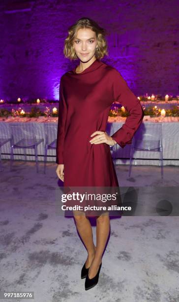 Model Arizona Muse arrives for the MONCLER x STYLEBOP.com event in Berlin, Germany, 11 October 2017. The dinner is to celebrate the collaboration...