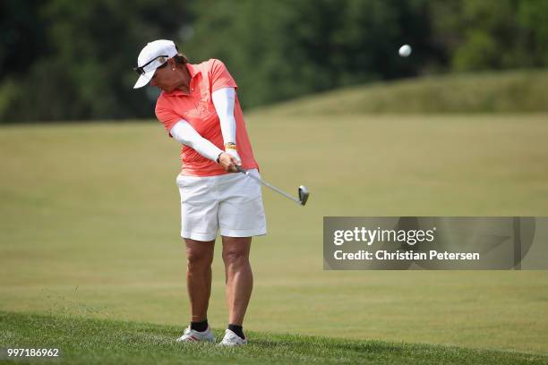 Alicia Dibos of Peru plays her second shot on the eighth hole during the first round of the U.S. Senior Women's Open at Chicago Golf Club on July 12,...