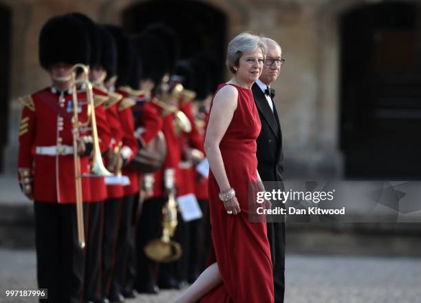 Britain's Prime Minister Theresa May and her husband Philip May wait for the arrival of U.S. President Donald Trump and First Lady Melania Trump at...