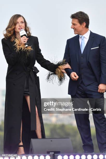 Actress Rebecca Ferguson and actor and producer Tom Cruise attend the 'Mission: Impossible - Fallout' Global Premiere in Paris on July 12, 2018 in...