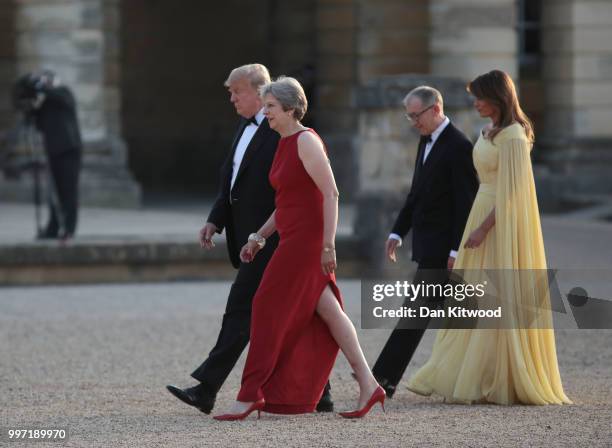 Britain's Prime Minister Theresa May and her husband Philip May greet U.S. President Donald Trump, First Lady Melania Trump at Blenheim Palace on...