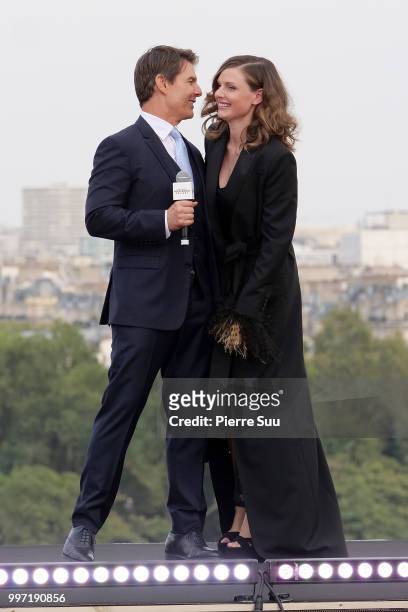 Tom Cruise and Rebecca Ferguson attend the 'Mission: Impossible - Fallout' Global Premiere on July 12, 2018 in Paris, France.