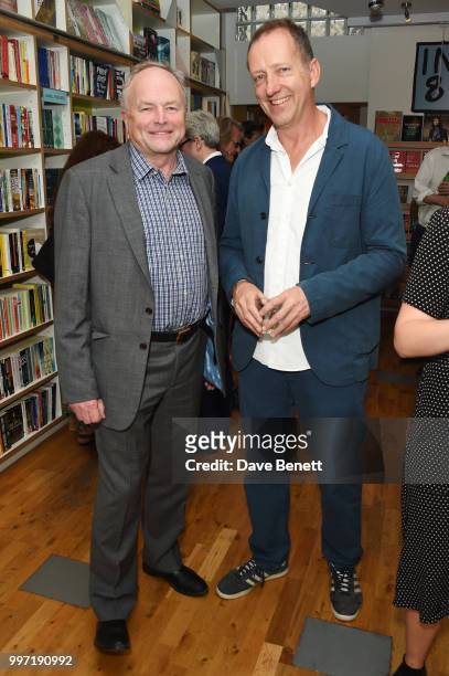 Clive Anderson and Tom Baldwin attend the launch of new book "Ctrl Alt Delete" by Tom Baldwin at Ink 84 on July 12, 2018 in London, England.