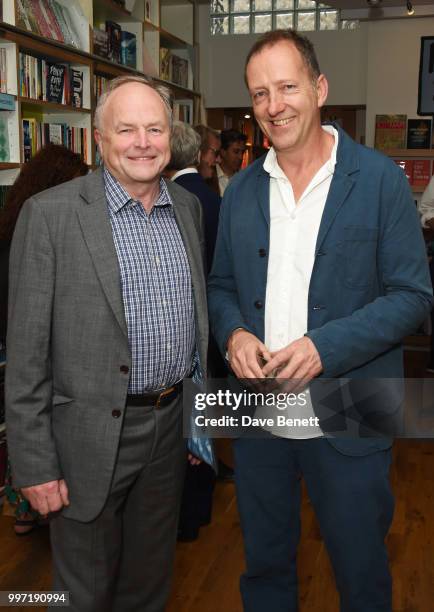 Clive Anderson and Tom Baldwin attend the launch of new book "Ctrl Alt Delete" by Tom Baldwin at Ink 84 on July 12, 2018 in London, England.