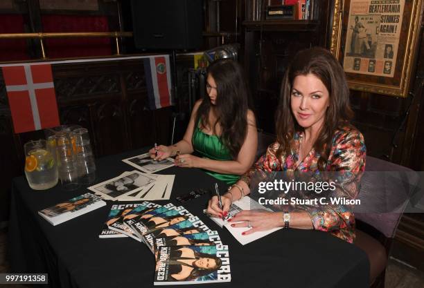 Kira Reed Lorsch and Nancy O'Brien sign copies of 'SCORE' at Hard Rock Cafe London on July 12, 2018 in London, England.