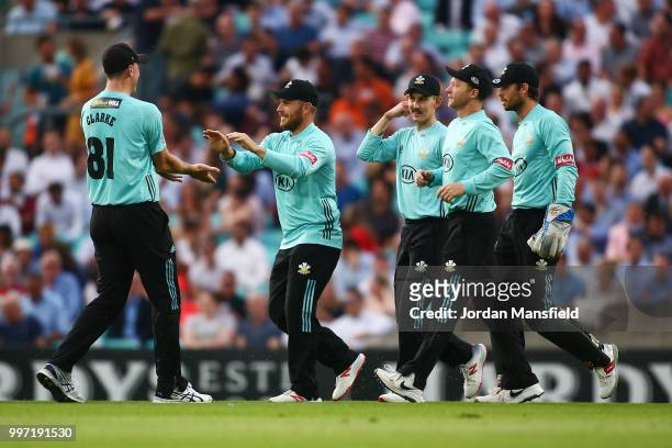 Aaron Finch of Surrey celebrates with his teammates after catching out Adam Wheater of Essex during the Vitality Blast match between Surrey and Essex...