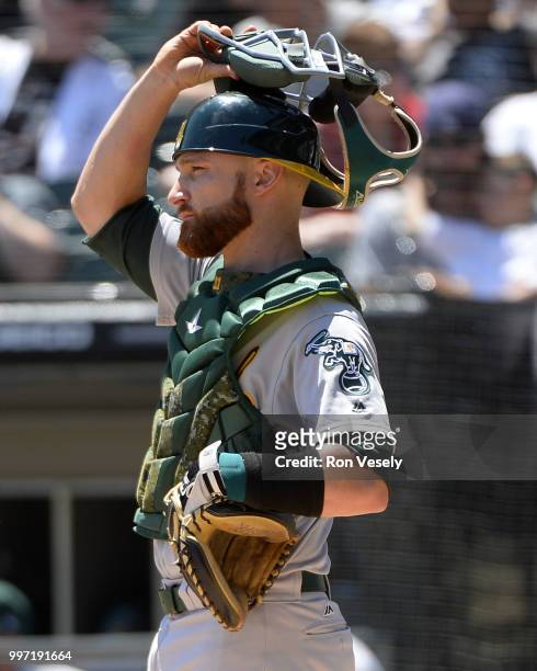 Jonathan Lucroy of the Oakland Athletics catches against the Chicago White Sox on June 23, 2018 at Guaranteed Rate Field in Chicago, Illinois.