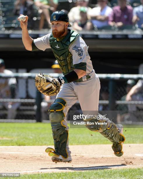 Jonathan Lucroy of the Oakland Athletics catches against the Chicago White Sox on June 23, 2018 at Guaranteed Rate Field in Chicago, Illinois.