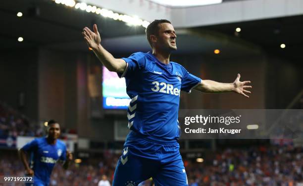 Jamie Murphy of Rangers celebrates scoring his sides first goal during the UEFA Europa League Qualifying Round match between Rangers and Shkupi at...