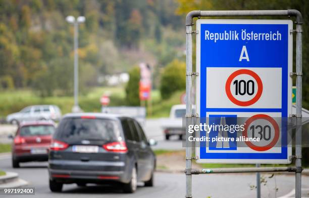 Road sign indicates the speed limit at the German-Austrian boarder along the A93 motorway in Niederndorf Bei Kufstein, Austria, 12 October 2017.)...