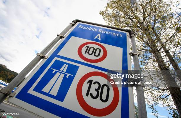 Road sign indicates the speed limit at the German-Austrian boarder along the A93 motorway in Niederndorf Bei Kufstein, Austria, 12 October 2017.)...