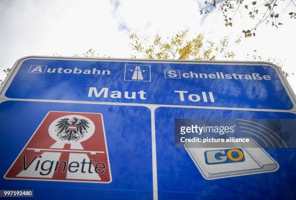 Road sign indicates the prevailing motorway toll for trucks and lorries in Austria at the German-Austrian boarder along the A93 motorway in...