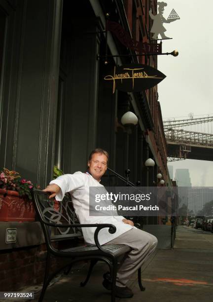 Chef Jacques Torres is photographed in front of his store on July 27, 2004 in Dumbo, New York.