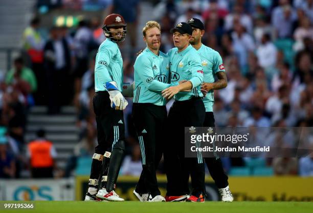 Gareth Batty of Surrey celebrates with his teammates after dismissing Tom Westley of Essex during the Vitality Blast match between Surrey and Essex...