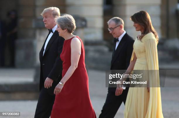 Britain's Prime Minister Theresa May and her husband Philip May greet U.S. President Donald Trump, First Lady Melania Trump at Blenheim Palace on...