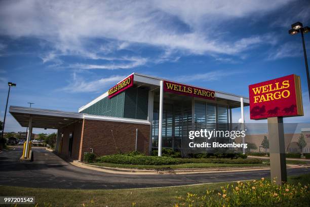 Wells Fargo & Co. Bank branch stands in Niles, Illinois, U.S., on Tuesday, July 10, 2018. Wells Fargo & Co. Is scheduled to release earnings figures...