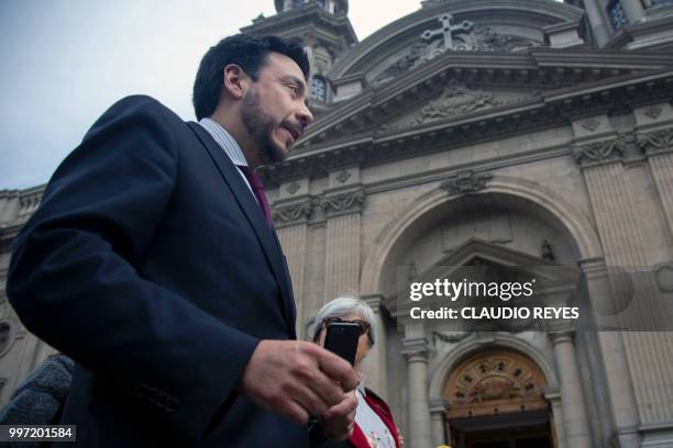 Regional prosecutor Emiliano Arias leaves the Archbishopric of Santiago, on July 12 after requesting the arrest warrant of former chancellor of the...