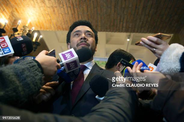 Regional prosecutor Emiliano Arias addresses the press at the Archbishopric of Santiago, on July 12 after requesting the arrest warrant of former...