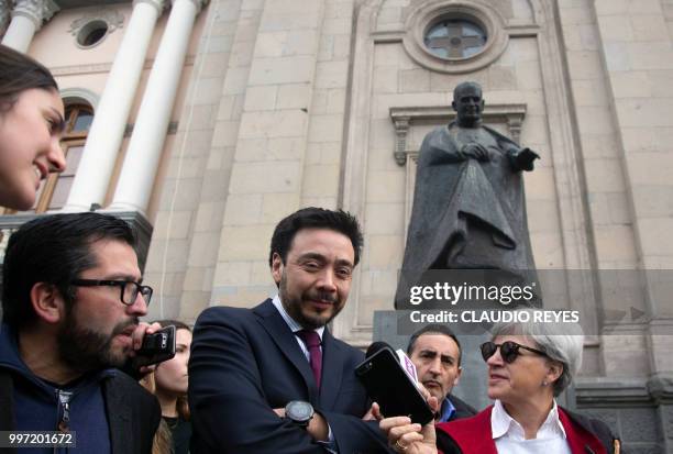 Regional prosecutor Emiliano Arias leaves the Archbishopric of Santiago, on July 12 after requesting the arrest warrant of former chancellor of the...