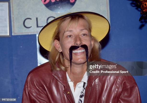 Martina Navratilova of the USA wearing a fake moustache and hat during the Pilkington Glass Tennis Championships at Devonshire Park circa June, 1991...