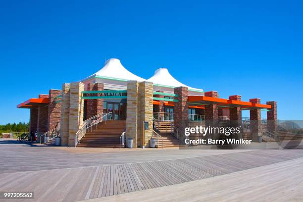 vibrant colors of boardwalk cafe at jones beach, ny - wantagh stock pictures, royalty-free photos & images