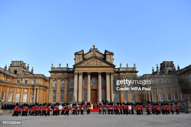 Britain's Prime Minister Theresa May and her husband Philip May greet U.S. President Donald Trump, First Lady Melania Trump at Blenheim Palace on...