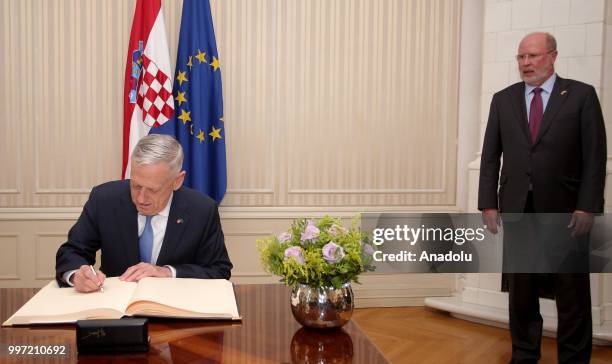 Secretary of Defense James Mattis signs a guest book during his visit to Zagreb, Croatia at Croatian Parliament on July 12, 2018.