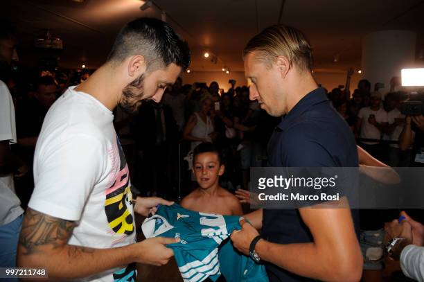 Luis Alberto and Lucas Leiva of SS Lazio attend the SS Lazio unveil new shirt for 2018-19 Season on July 12, 2018 in Rome, Italy.