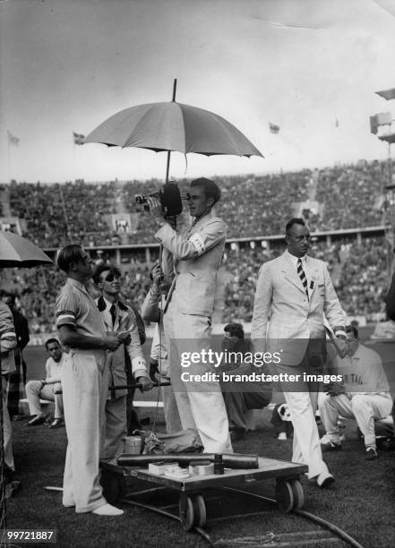 Cameraman at the Olympic games 1936. Photographie. Berlin. Germany. 1936.