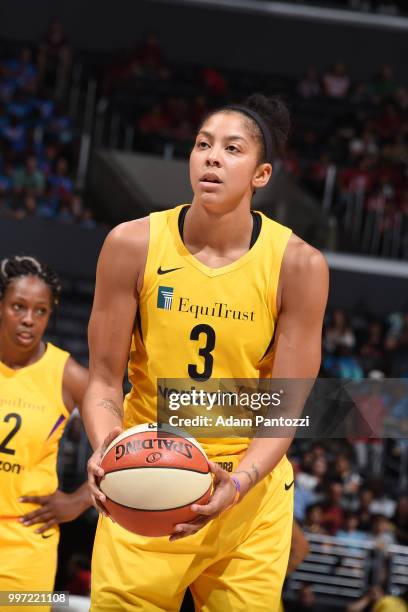 Candace Parker of the Los Angeles Sparks handles the ball against the Dallas Wings on July 12, 2018 at STAPLES Center in Los Angeles, California....