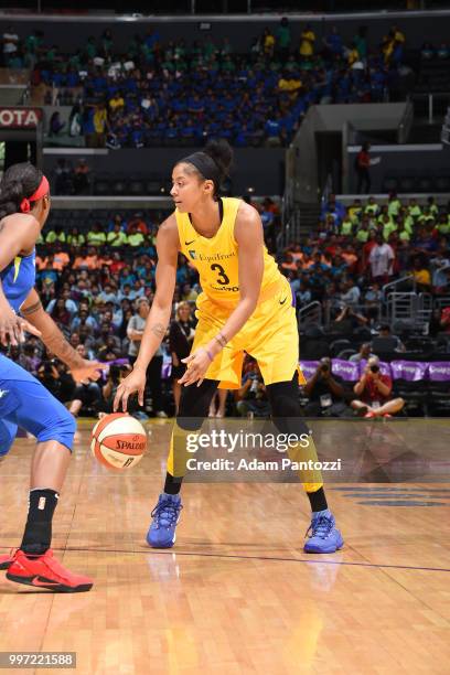 Candace Parker of the Los Angeles Sparks handles the ball against the Dallas Wings on July 12, 2018 at STAPLES Center in Los Angeles, California....