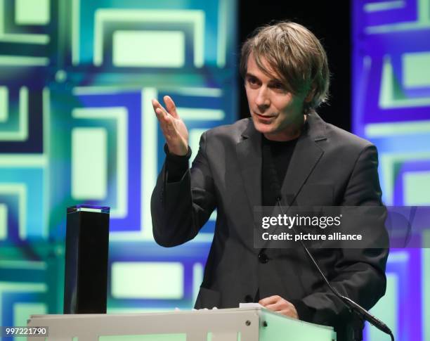 Actor Jens Harzer deliviers his acceptance speech during the 'Hessischen Film- und Kinopreises' at the Alte Oper opera house in Frankfurt, Germany,...