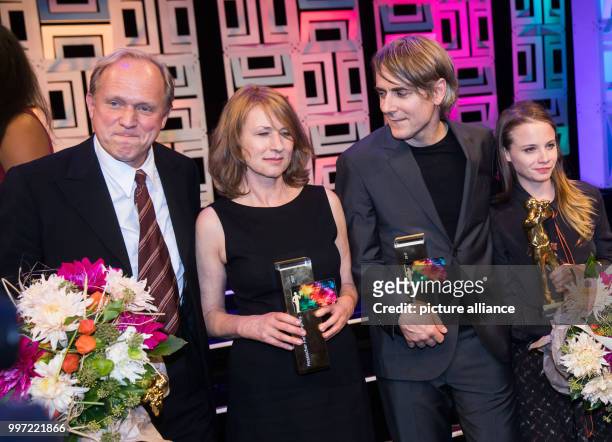 Actors Ulrich Tukur , Corinna Harfouch, Jens Harzer and Jasna Fritzi Bauer stand together on stage after award ceremony of the 'Hessische Film- und...
