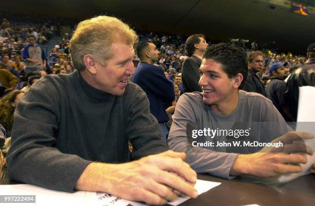 Former UCLA player Bill Walton sitting courtside with his son Chris during game vs Arizona at Pauley Pavilion. Bill Walton's other son, Luke Walton,...