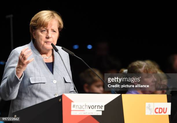 German Chancellor Angela Merkel speaks during a CDU campaign event for the regional elections in Osnabrueck, Germany, 13 October 2017. Photo: Carmen...