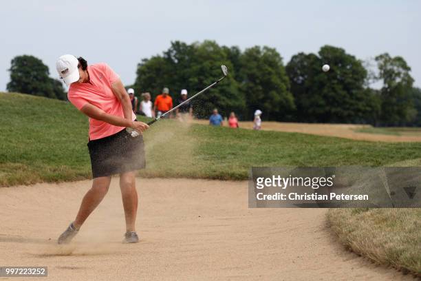 Janet Moore chips from the bunker onto the 18th green during the first round of the U.S. Senior Women's Open at Chicago Golf Club on July 12, 2018 in...