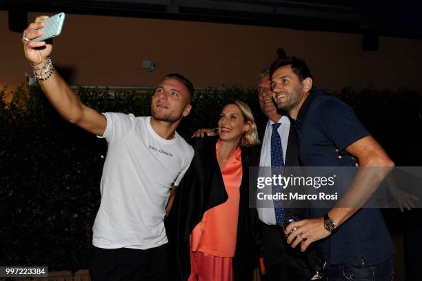 Ciro Immobile and Senad Lulic of SS Lazio attend the SS Lazio unveil new shirt for 2018-19 Season on July 12, 2018 in Rome, Italy.