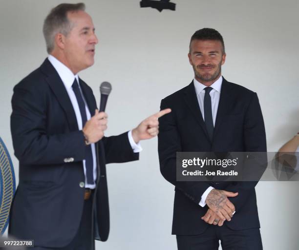 Jorge Mas and David Beckham address a rally being held next to Miami City Hall in support of building a Major League soccer stadium on July 12, 2018...