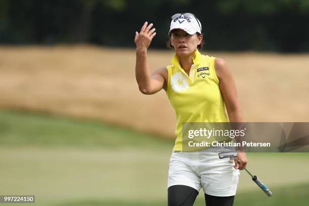 Eriko Gejo of Japan reacts to a missed putt on the 18th green during the first round of the U.S. Senior Women's Open at Chicago Golf Club on July 12,...