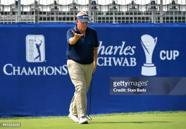 Colin Montgomerie reacts to his putt on the 18th green during the first round of the PGA TOUR Champions Constellation SENIOR PLAYERS Championship at...